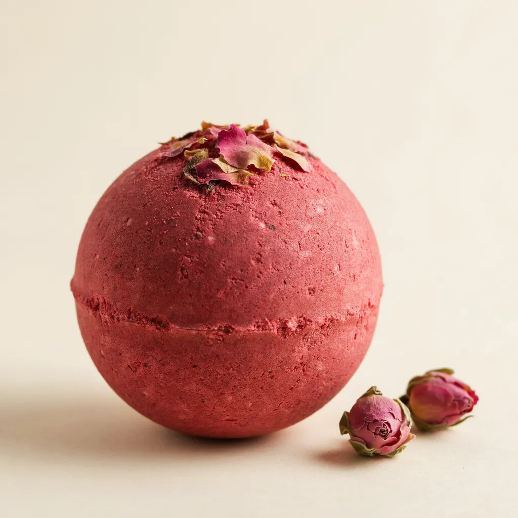 Mystic Oud Blossom mugwort bath bomb, crimson with dried rosebuds